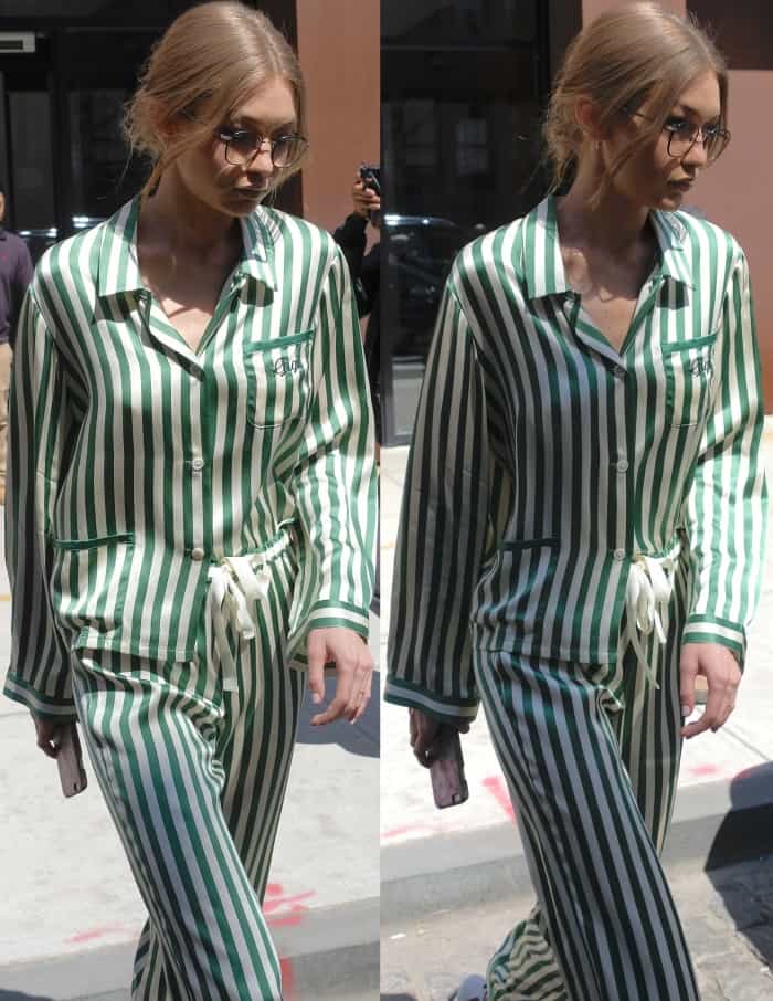 Gigi Hadid wearing a Morgan Lane emerald silk pajama set and Stuart Weitzman "Nudistsong" sandals in NYC