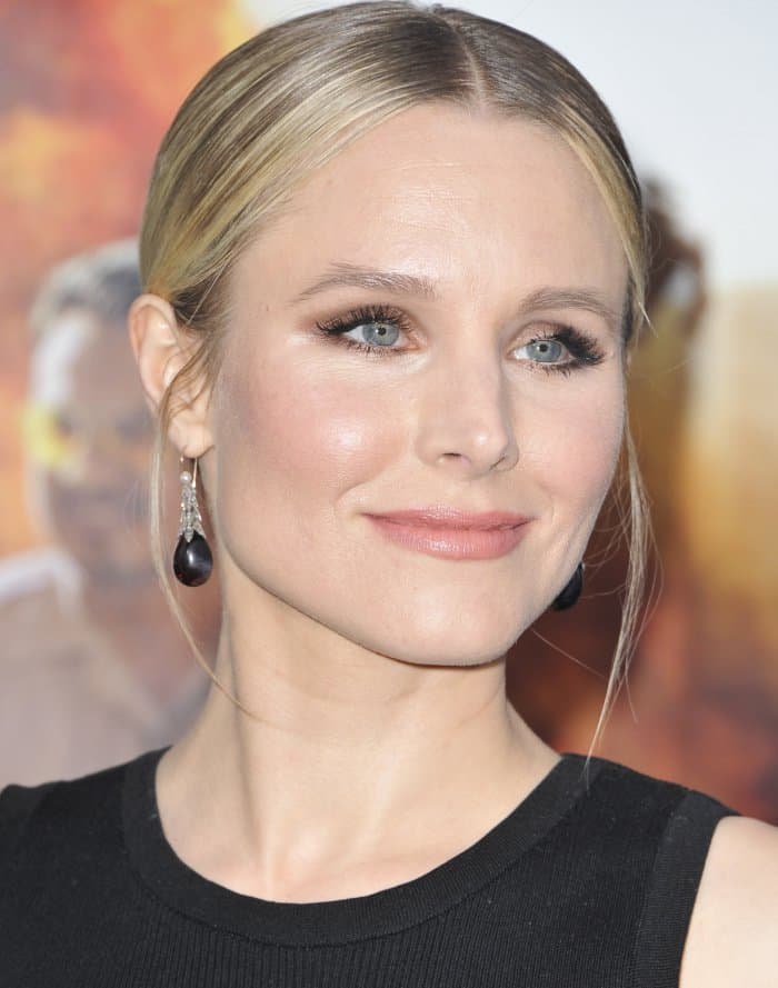 Kristen Bell's radiant beauty look and sleek bun contributed to the overall modernity of her outfit at the premiere of “Chips”