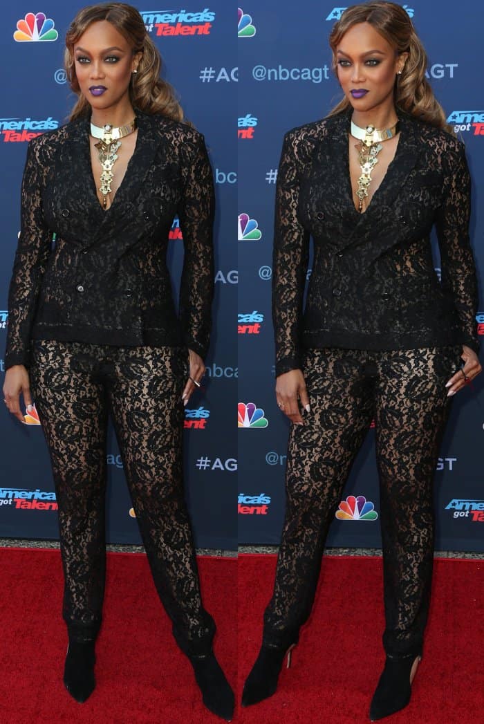 Tyra Banks wearing a sheer black lace ensemble with black booties at the "America's Got Talent" Season 12 Kickoff