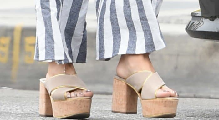 Adding a touch of sophistication to her coffee run style, Vanessa Hudgens opted for Prada mule sandals during a java outing in Los Angeles