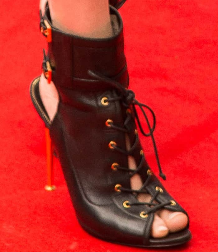 Alexandra Daddario opted for a pair of Tom Ford lace-up boots to complete her ensemble