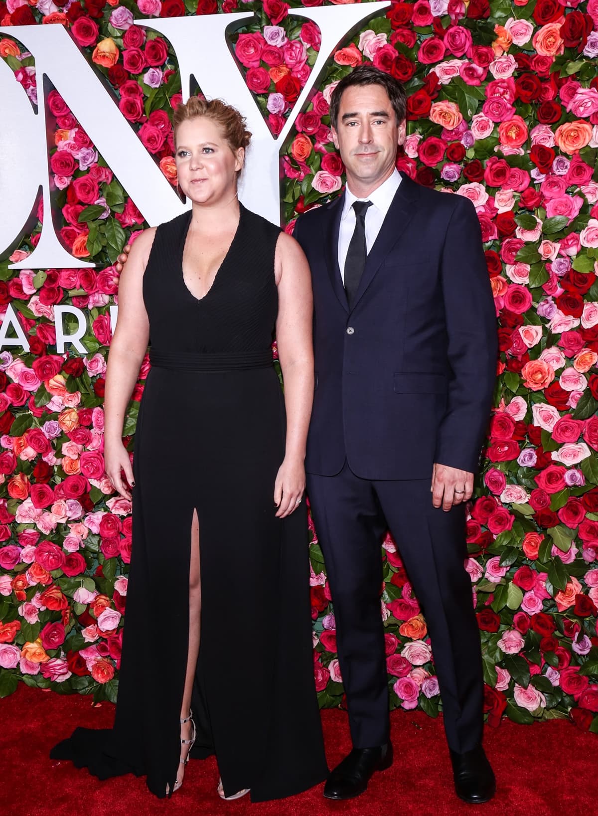 Amy Schumer joined her taller husband Chris Fischer on the red carpet