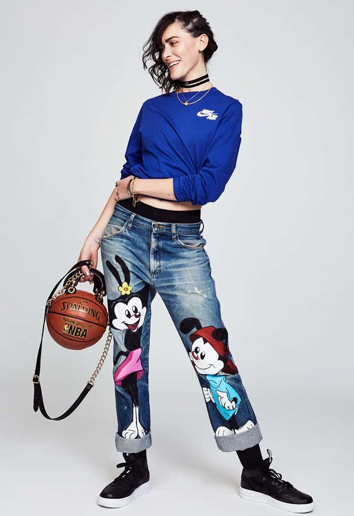 Artist and designer Andrea Bergart showcases her signature Basketball Purse—crafted from an authentic Spalding NBA ball with gold chain harness—blending sporty streetwear with high-fashion flair