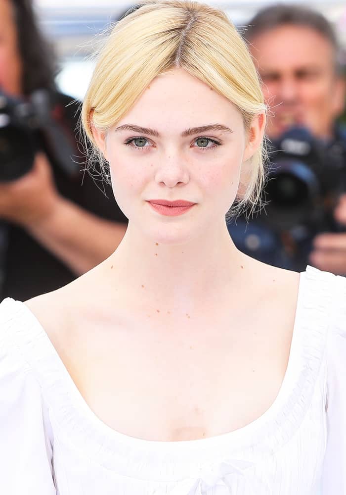 Elle Fanning went for the innocent peasant-girl-next-door look at the 2017 Cannes Film Festival photo call for "The Beguiled"