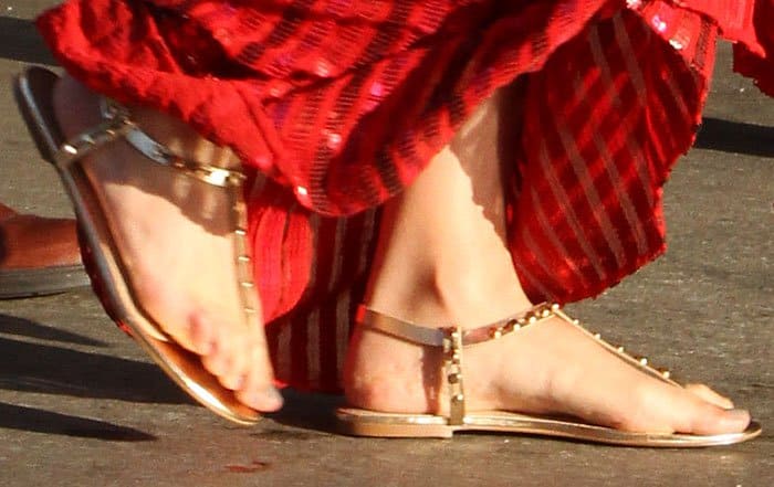 A closer look at Gal Gadot’s gold Aldo "Starda" studded sandals, which she wore for comfort at the Wonder Woman premiere