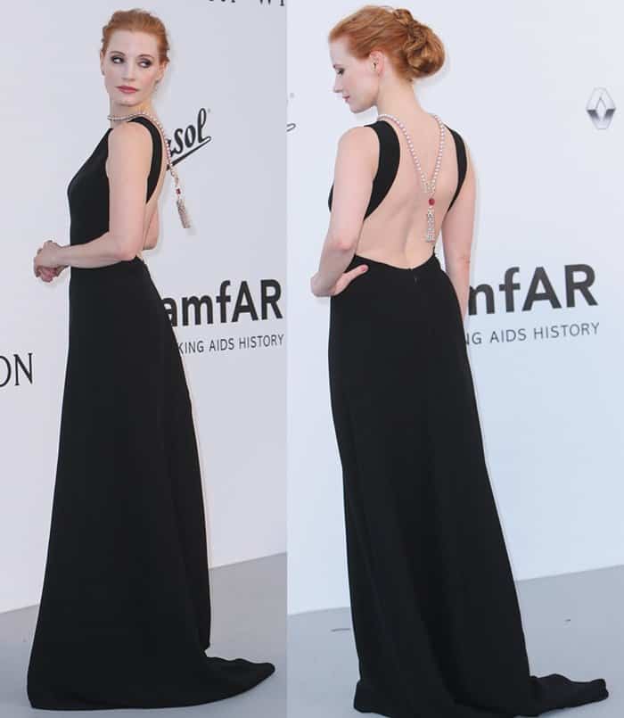 Jessica Chastain wore a long, black Prada gown that featured a low back style