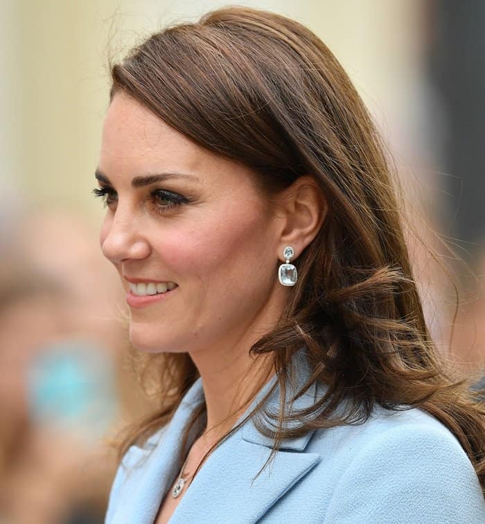 Kate Middleton's stunning drop earrings from Kiki McDonough feature blue topaz oval and cushion cut stones surrounded by small circle diamonds