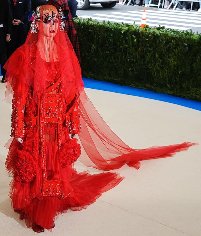 Katy Perry embodies fiery elegance in a custom Maison Margiela Couture gown at the 2017 Met Gala