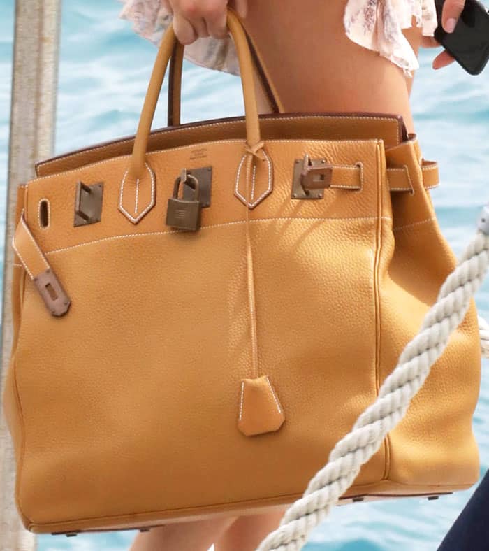 Kendall puts her yacht essentials in an oversized Hermès "Birkin" tote