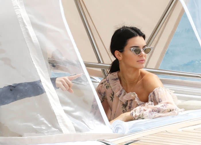 Kendall Jenner enjoys a relaxing boat ride in Cannes, looking chic in a floral Zimmermann romper and stylish sunglasses
