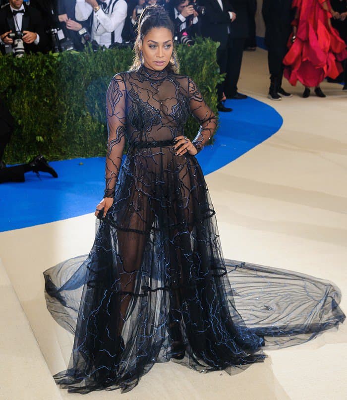 La La Anthony's gown featuring black diamond jewelry and small sheer train