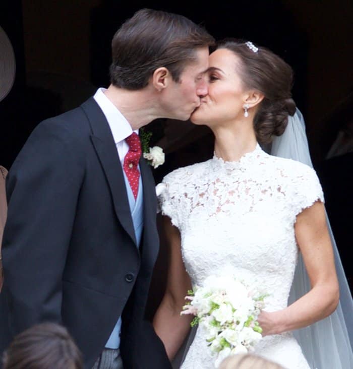 Pippa Middleton and James Matthews share a romantic kiss after their wedding ceremony at St. Mark's Church in Englefield