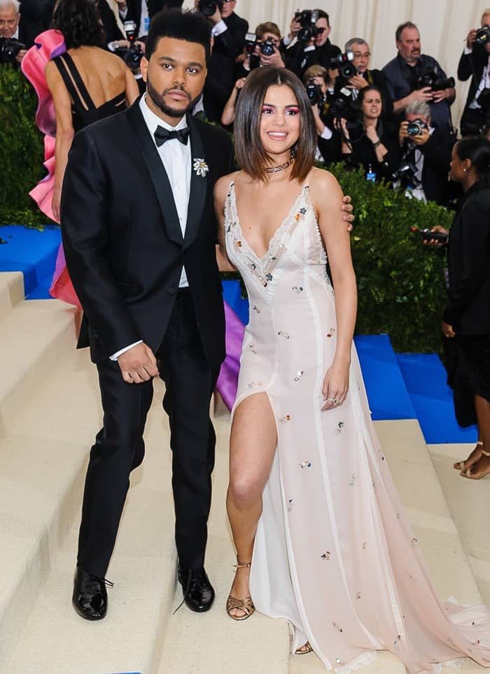 The Weeknd with girlfriend Selena Gomez at the 2017 Met Gala held at the Metropolitan Museum of Art in New York City.