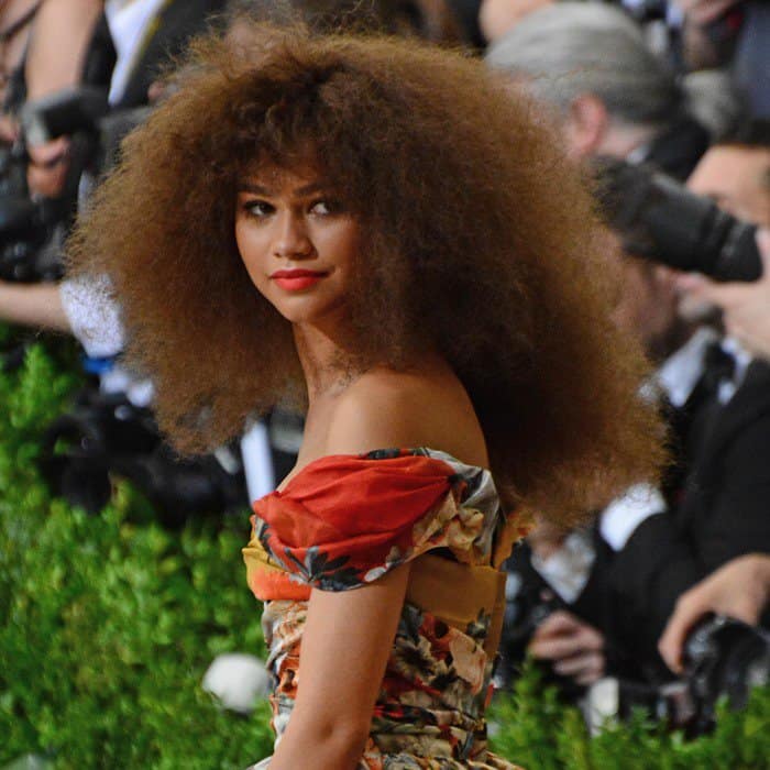 Zendaya channels retro glam with voluminous disco curls that perfectly complement her bold Met Gala ensemble