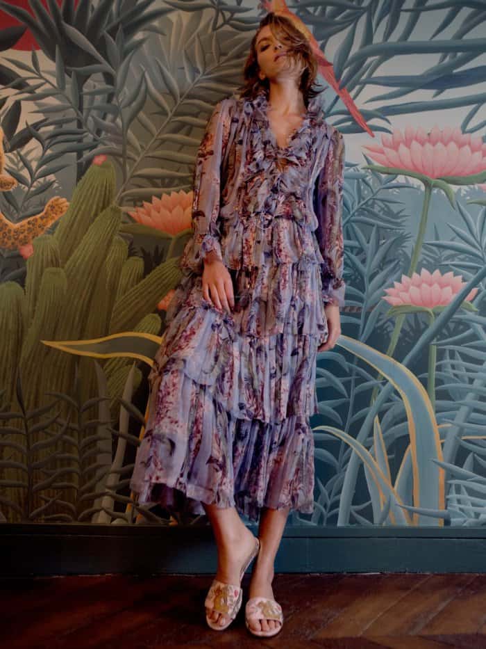 Arizona Muse wearing the Aquazzura for de Gournay embroidered slides with Zimmermann’s floral-print silk-georgette blouse and matching skirt