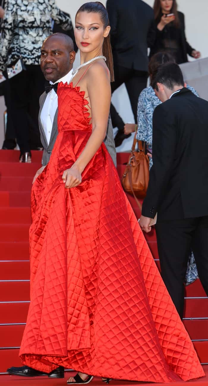 Bella Hadid wearing a Christian Dior spring 2017 couture gown and black sandals at the 70th Cannes Film Festival "Okja" premiere