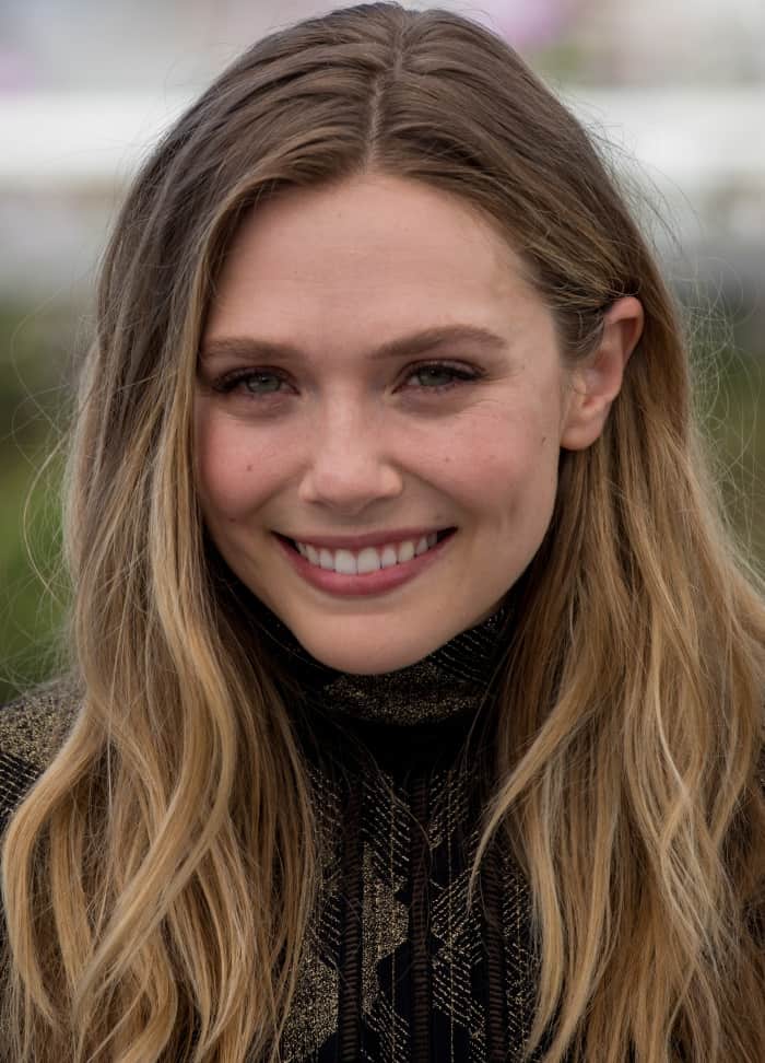 Elizabeth Olsen wearing a Marc Jacobs turtleneck mini dress and Nicholas Kirkwood "Leda" pumps at the 70th Cannes Film Festival "Wind River" Photocall