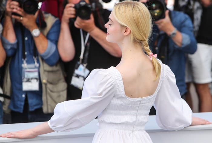 Elle Fanning wearing head-to-toe Alexander McQueen at "The Beguiled" photocall during the 70th annual Cannes Film Festival