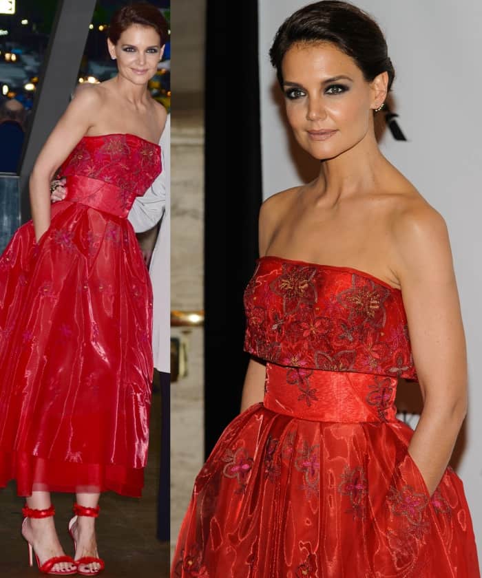 Katie Holmes in a stunning red dress featuring a cinched waist and a ballgown style skirt