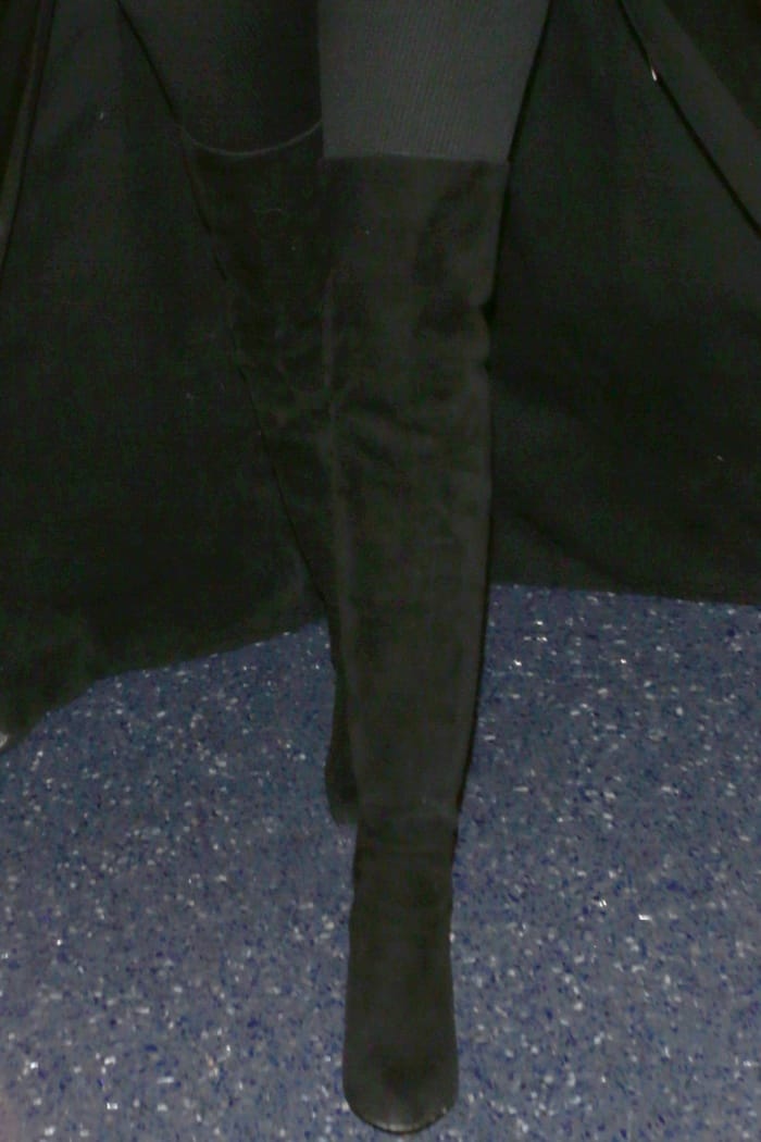 Khloé Kardashian in knee-high Gianvito Rossi black suede boots