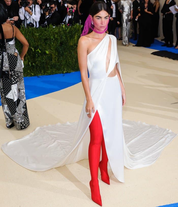 Lily Aldridge wearing a custom Ralph Lauren gown and Balenciaga Knife thigh-high boots at the 2017 Met Gala