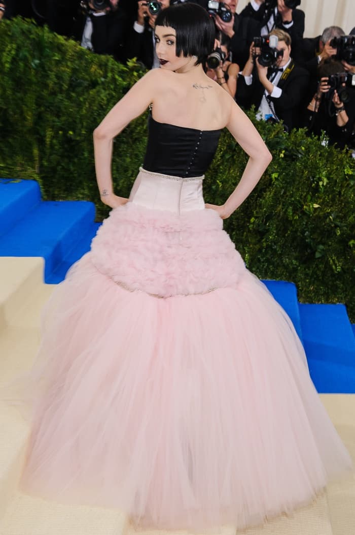 Lily Collins wearing a Giambattista Valli fall 2016 couture gown and Charlotte Olympia "Eugenie" sandals at the 2017 Met Gala