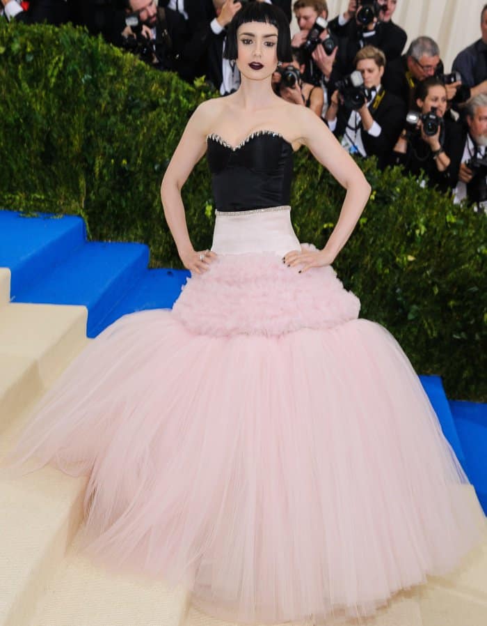 Lily Collins wearing a Giambattista Valli fall 2016 couture gown and Charlotte Olympia "Eugenie" sandals at the 2017 Met Gala