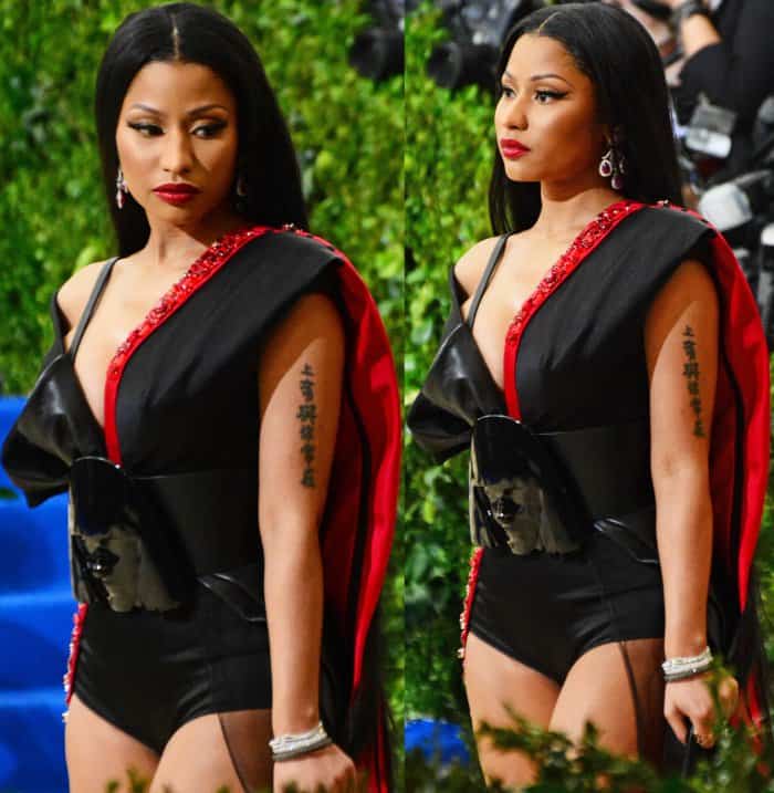 Nicki Minaj wearing a custom H&M gown and Versace "Medusa" platform sandals at the 2017 Met Gala