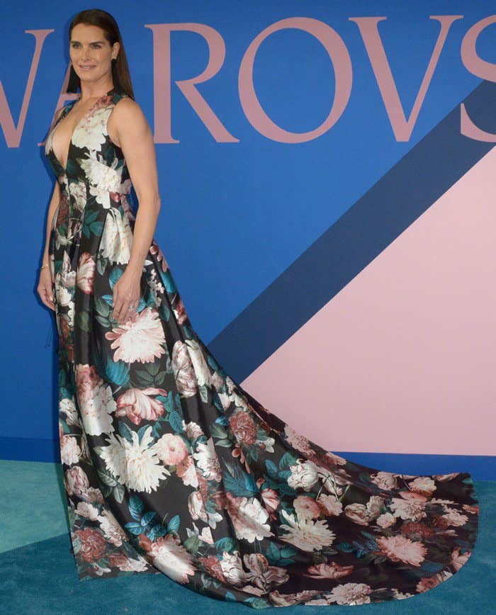 We love the dramatic long train of this floral gown!