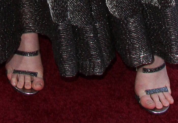 Elle Fanning paired her midi with Tamara Mellon Frontline glitter sandals