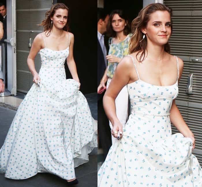 Emma Watson made sure she avoided dirt on her gown's hemline by carrying her skirt.