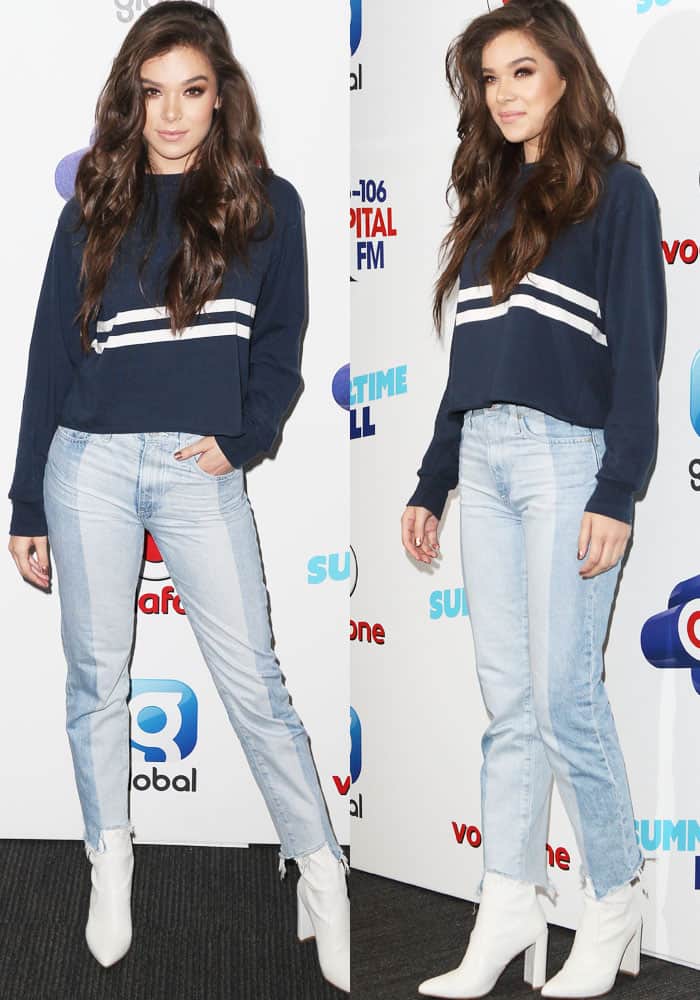 Hailee takes a break from her skin-baring costumes with a toned down jeans-and-top look
