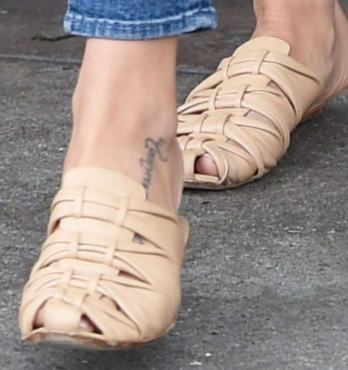 Jenna remains stylish in a casual pair of The Row "Capri" slides