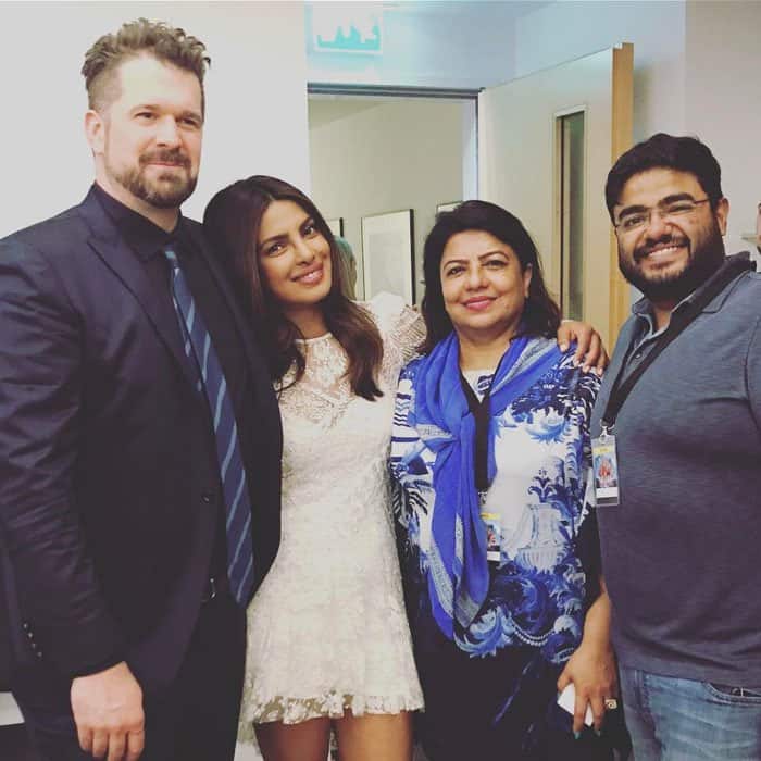 Priyanka takes a photo backstage after the Berlin photocall