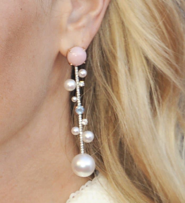 Pink and blue stones add a touch of fun detailing to the pearl earrings