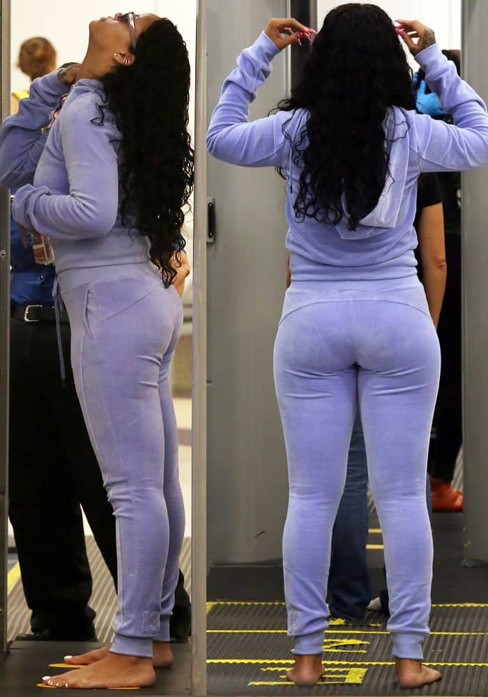 Rihanna shows off a more voluptuous physique as she goes through security checks