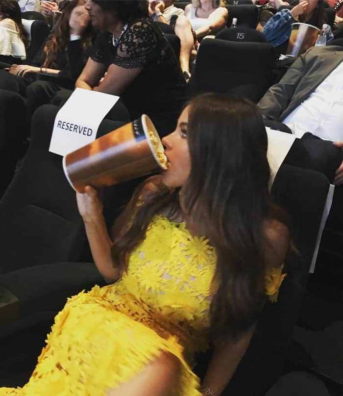 The actress uploads a photo of herself chowing down on some popcorn