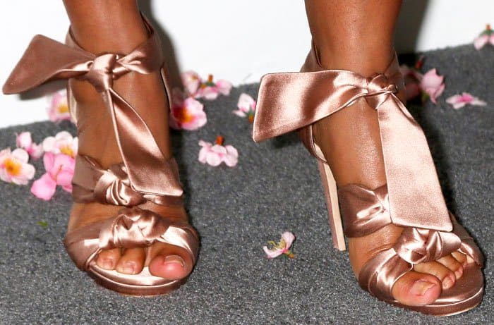 Tracee Ellis Ross wraps up her fun and quirky look with satin Jimmy Choo "Kris" sandals