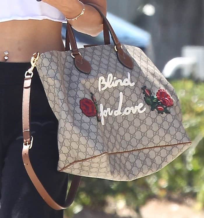 Vanessa Hudgens monogram Gucci tote is a standout piece with its added embellishments.