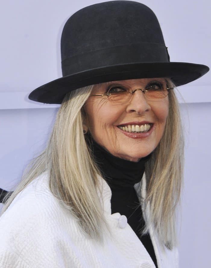 Diane Keaton wearing a monochromatic ensemble styled with Louis Vuitton "Star Trail" ankle boots at the 45th American Film Institute Life Achievement Award Gala Tribute