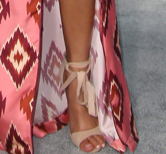 Jhene Aiko showing off her feet in Schutz sandals