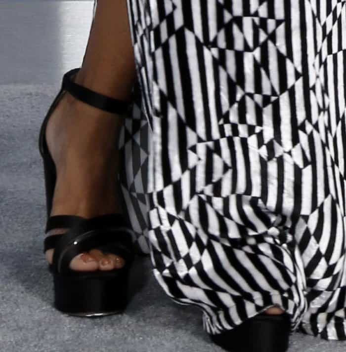 Kat Graham showing off her feet in black platform sandals