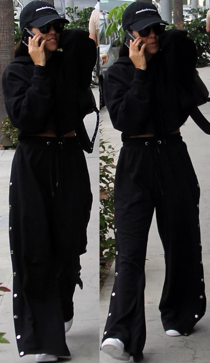 Kourtney Kardashian rocks a black baseball cap in Beverly Hills