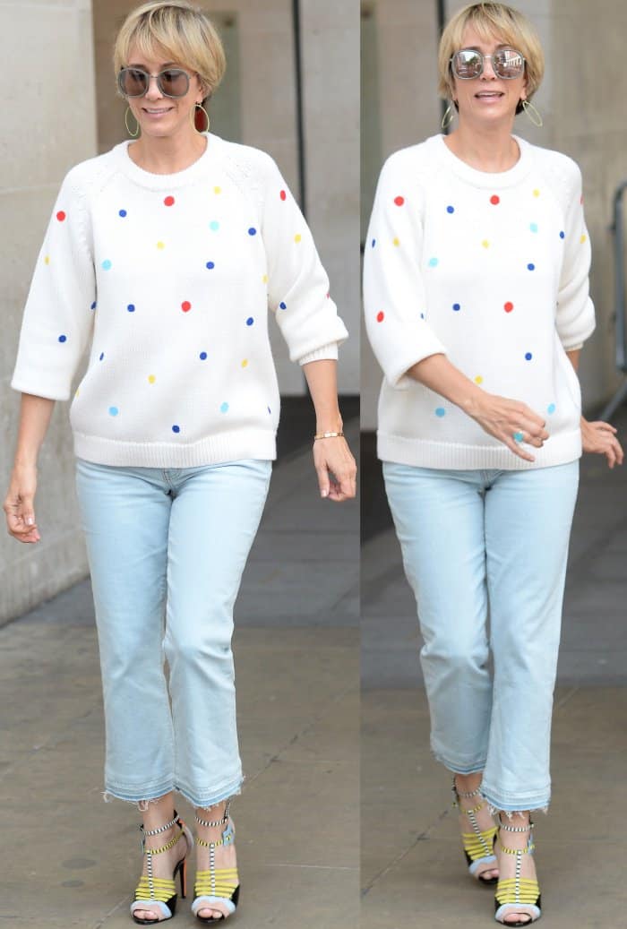 Kristen Wiig brings casual chic to life at the BBC Radio 1 studios in London, perfectly balancing comfort with style in a Tory Sport sweater and Pierre Hardy sandals