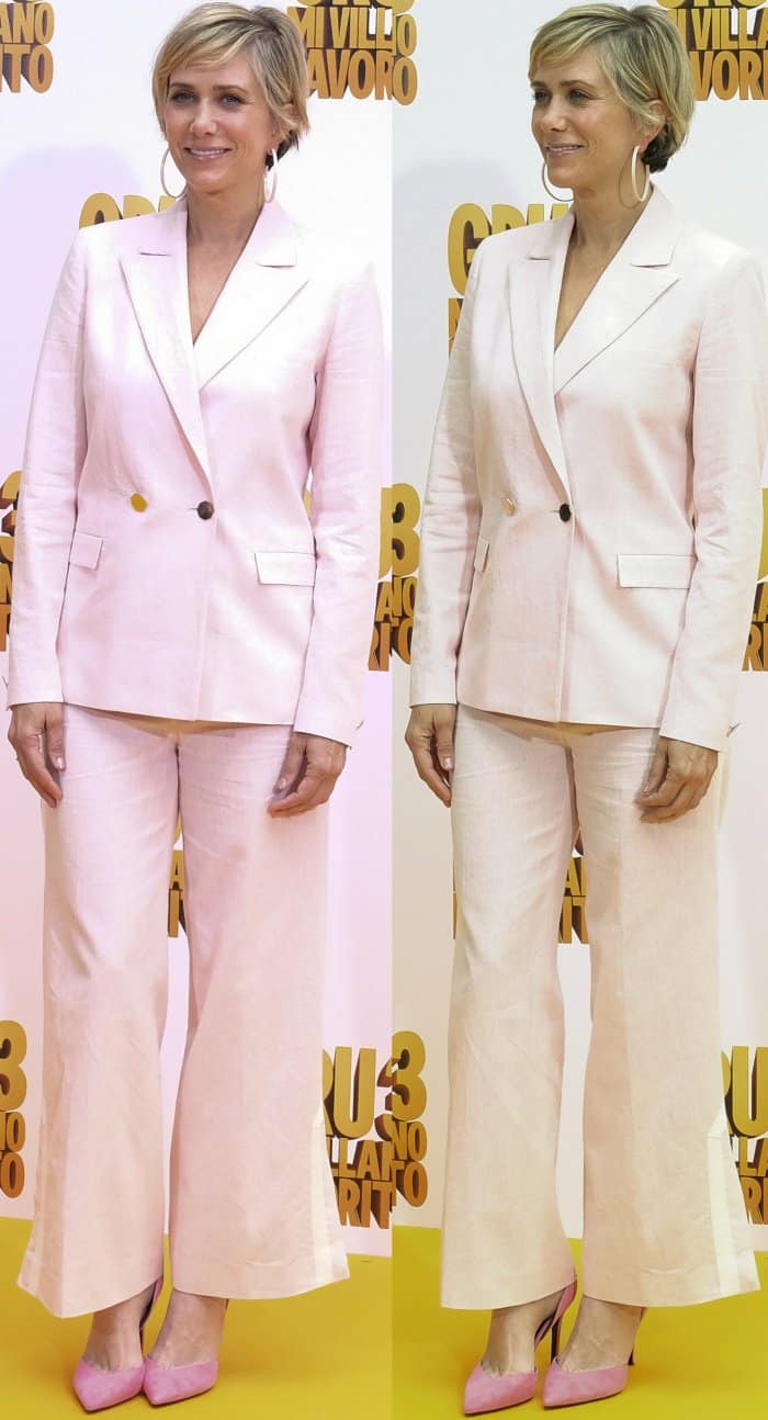 A statuesque pose: Kristen Wiig showcases the full charm of her pink Osman ensemble and matching Stella Luna pumps on the yellow carpet