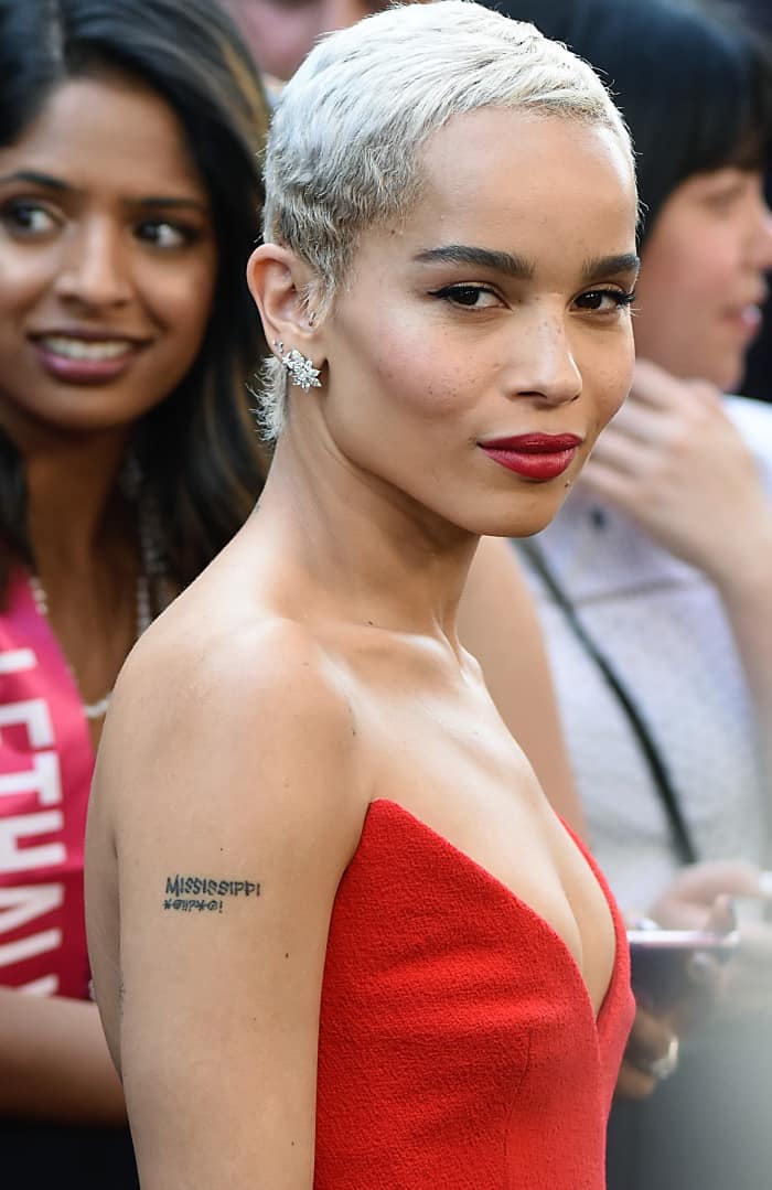 Zoe Kravitz shows off her Tiffany & Co. diamond cluster earrings and "MISSISSIPPI *@!!?*@!” tattoo that's a tribute to Nina Simone‘s song “Mississippi Goddamn”