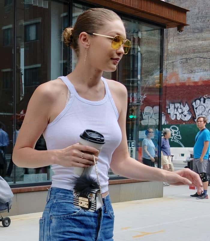 Gigi Hadid paired her casual getup with a tiny Furla Metropolis Jungle Bag.