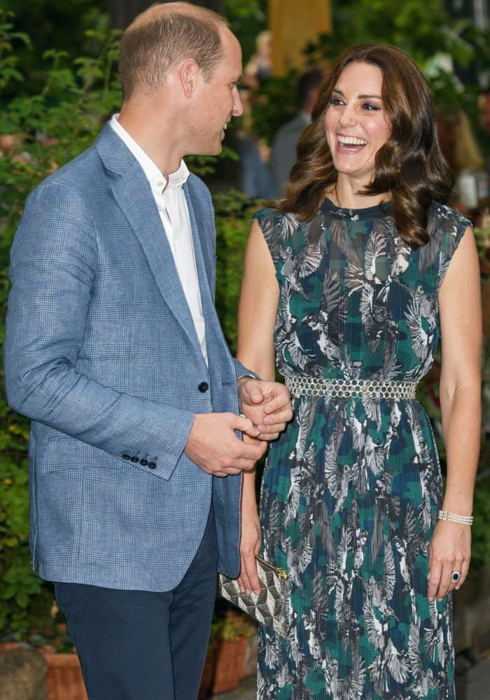 The Duke and Duchess share a hearty laugh as they toured the ball house