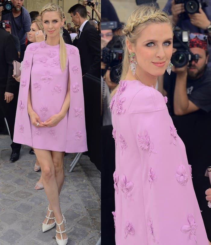 Nicky Hilton wearing a caped pink dress at the Valentino show at Paris Fashion Week.