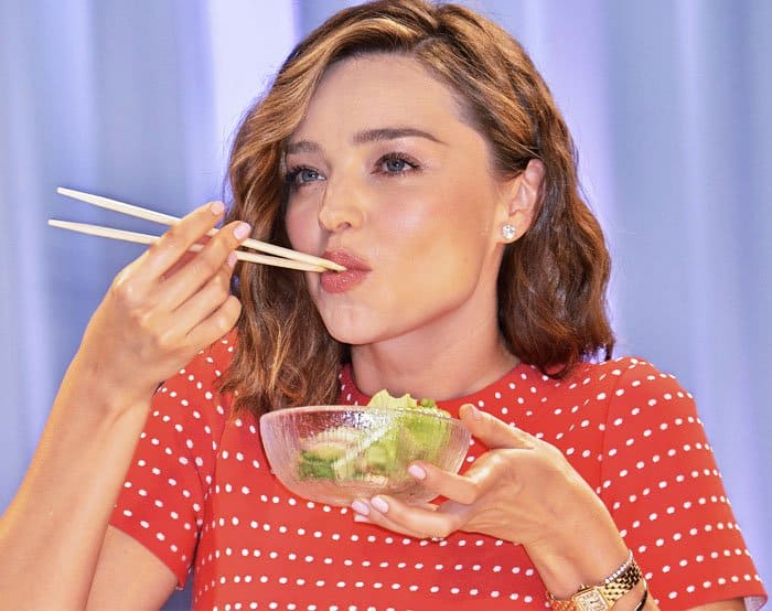 Miranda samples a salad at her organic miso promotions